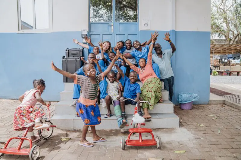 Marion Turc, Hope Center Facilitator, with patients at the HOPE Centre.