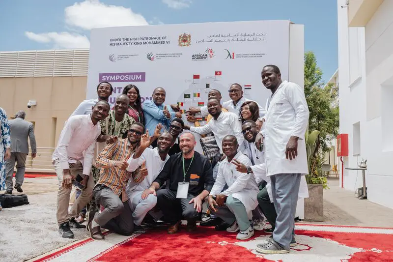 Dr. David Ugai, Prof. Mohamed Siddick Fadiga, and Guinean students and staff pose for a photo at the African Dental Education Symposium in Casablanca, Morocco.