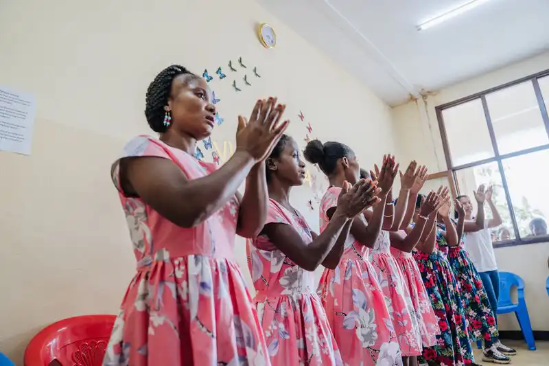 Women dancing during the dress ceremony at the Freedom from Fistula Clinic.