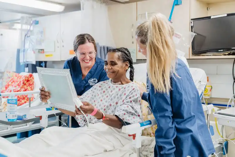 Vavitsara, general patient, with Juliana Speth, Ward Nurse (Paediatric ICU), and Laura Tice, Ward Nurse (Paediatric), at the ward after her surgery.