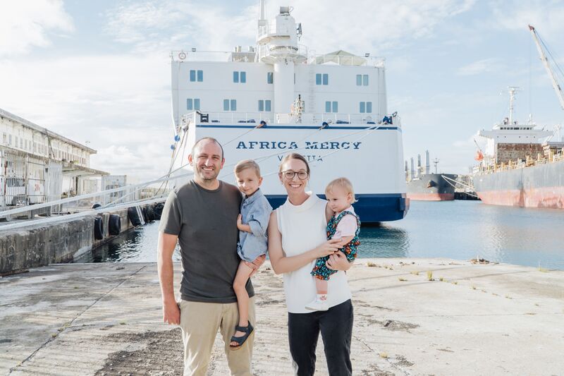 Suzanne Veltjens, Primary Caregiver, and Nick Veltjens, Clubfoot Program Consultant, with their children.