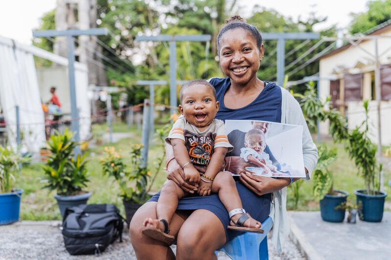 Alfredo, maxillofacial patient, at the HOPE Centre with his mother.
