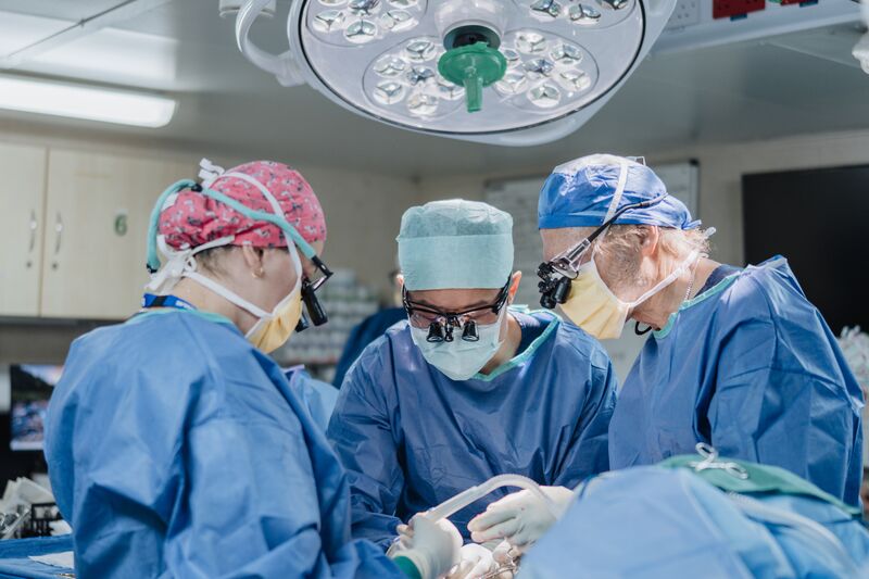 Dr. John Tzou and Dr. Tertius Venter, Reconstructive Plastic Surgeons, performing a surgery at the OR.