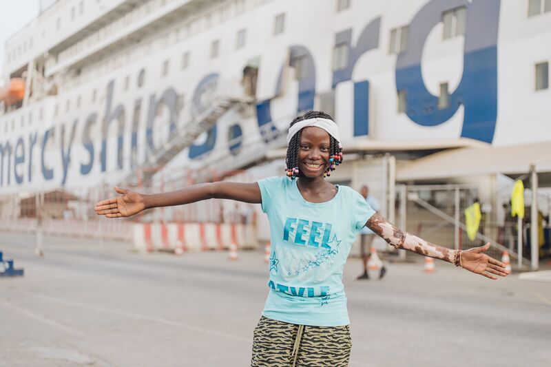 Jaminatu, plastics patient, on the dock.